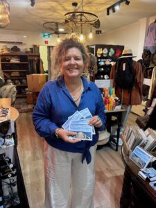 Karen at Sonny Jim's with Wynnum postcards